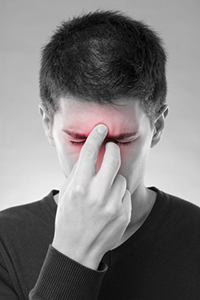 Man with sinus pain